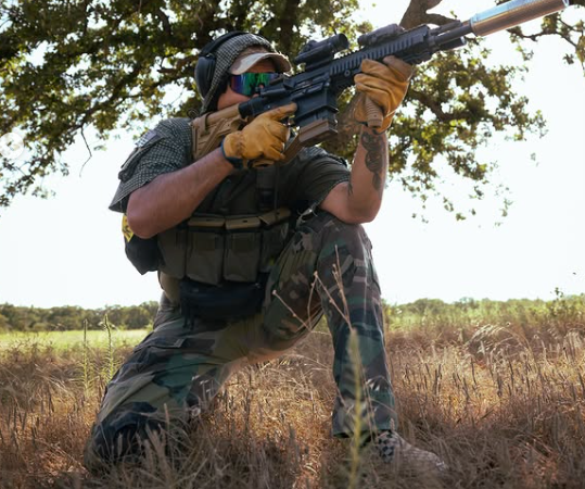 Oscar4Fox DNC Hooded Combat Shirt — kneeling with suppressed rifle, boots visible